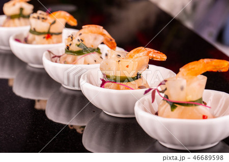 Shrimps in sacks from the test with greens and ses 46689598