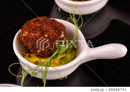 Cabbage in crackers with chips from onions Cabbage in crackers with chips from onions 46689741