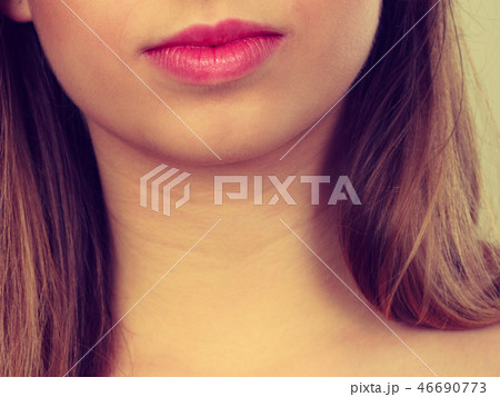 Detailed closeup of woman red lips Detailed closeup of woman red lips 46690773