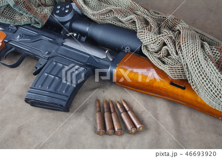 SVD sniper rifle on khaki canvas 46693920