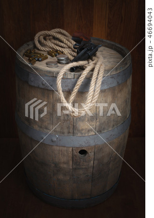 Old western revolver with cartridges and dollar Old western revolver with cartridges and dollar 46694043