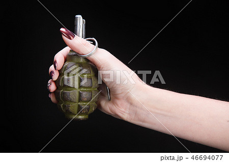 fragmentation grenade in girl hand fragmentation grenade in girl hand 46694077