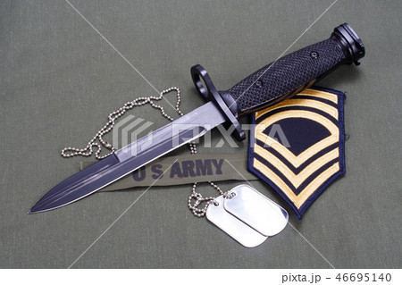bayonet with dog tags on US ARMY uniform  46695140