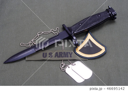 bayonet with dog tags on US ARMY uniform  46695142
