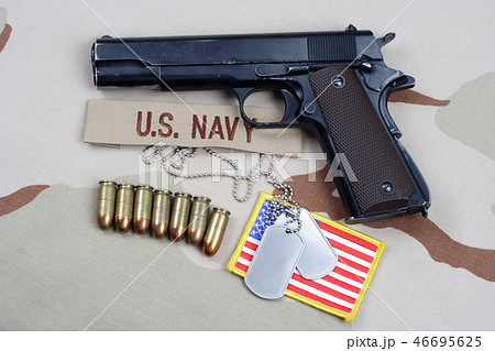 Colt government 1911 with U.S. NAVY uniform 46695625