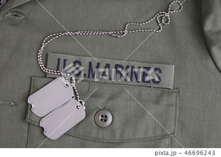 U.S. MARINES Tape with dog tags on uniform U.S. MARINES Tape with dog tags on uniform 46696243