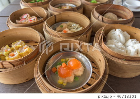 dim sum in bamboo steamer, chinese cuisine. 46713301