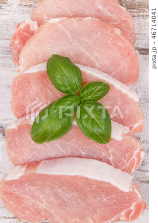 Fresh loin with basil for cooking lunch or dinner 46714041