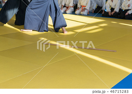 People in kimono on martial arts weapon training seminar People in kimono on martial arts weapon training seminar 46715283