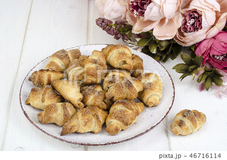 Homemade mini croissants with sugar and cinnamon, Homemade mini croissants with sugar and cinnamon, 46716114