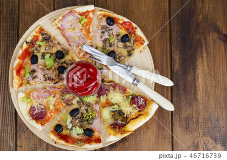 Six slices of pizza with different toppings Six slices of pizza with different toppings 46716739