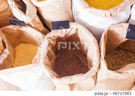 Carton bags of crops and cereal at grocery store 46717965
