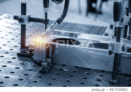 The welding robot machine . 46720962