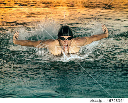 Swimmer breathing during swimming butterfly 46723364