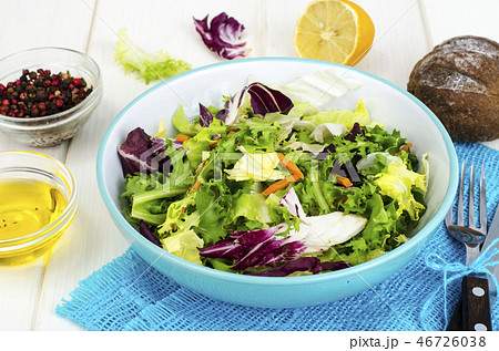 Salad from mix of herbs (iceberg, radiccio, friis Salad from mix of herbs (iceberg, radiccio, friis 46726038