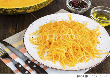 Vegetarian salad of fresh organic pumpkin, raw Vegetarian salad of fresh organic pumpkin, raw 46726998