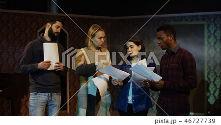 Actors arguing during rehearsal in a theater Actors arguing during rehearsal in a theater 46727739
