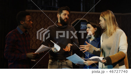 Actors arguing during rehearsal in a theater Actors arguing during rehearsal in a theater 46727740