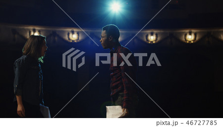 Actors rehearsing a scene in a theater Actors rehearsing a scene in a theater 46727785