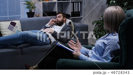 Young man talking to a psychologist Young man talking to a psychologist 46728343