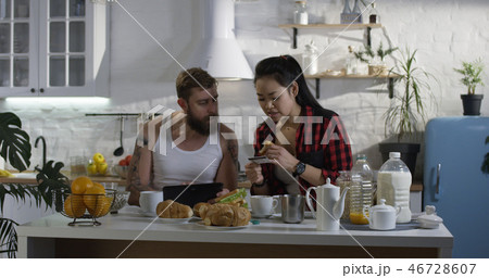 Man and woman talking during breakfast Man and woman talking during breakfast 46728607
