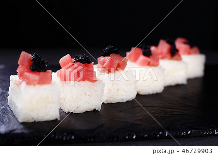 seafood restaurant, pressed sushi with tuna 46729903