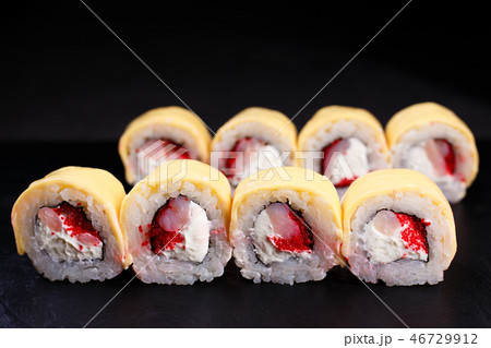 sushi rolls with scallop in grilled cheese 46729912