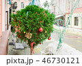 Tuya in the shape of a ball is decorated as a New Year link with red balls and tree toys on the 46730121