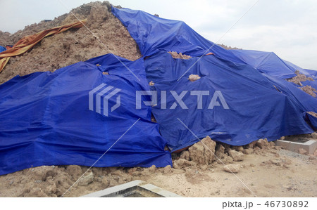Temporary slope protection use the plastic sheet Temporary slope protection use the plastic sheet 46730892