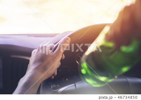 Drinking and driving ,man drinking alcohol while driving car Drinking and driving ,man drinking alcohol while driving car 46734850