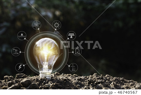 Energy saving light bulb on nature background Energy saving light bulb on nature background 46740567