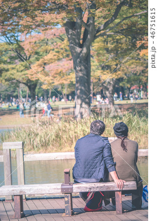 Lovly couple sit on bench at Yoyogi Park 46751615
