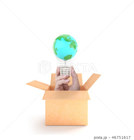 Hand holding earth in light bulb in cardboard Box 46751617