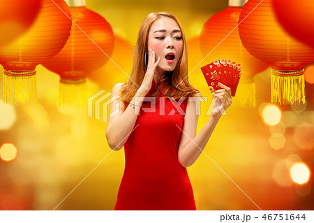 Excited chinese woman in traditional dress Excited chinese woman in traditional dress 46751644