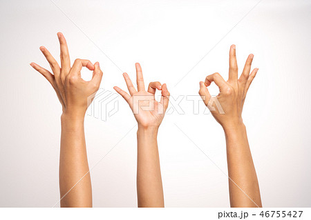 women hand OK sign gesturing on white background 46755427