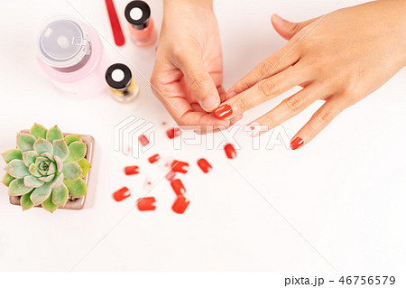 women manicure and attach a nail shape with gel women manicure and attach a nail shape with gel 46756579