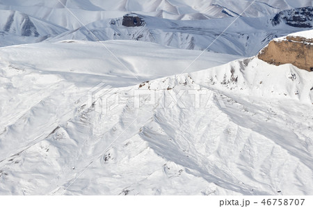 Mountain range in snow at sun winter day 46758707