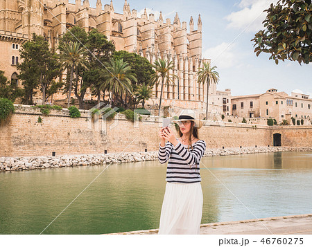 Happy woman with a smartphone 46760275