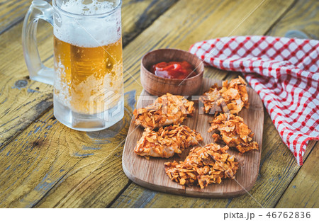 Barbecue chicken bites with mug of beer Barbecue chicken bites with mug of beer 46762836