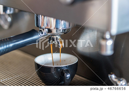 coffee machine making espresso in a cafe coffee machine making espresso in a cafe 46766656