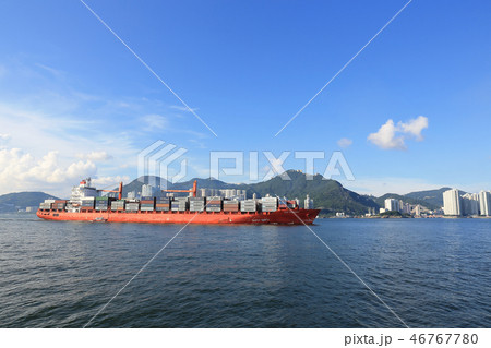 Cargo ship passing the East Lamma Channel Cargo ship passing the East Lamma Channel 46767780