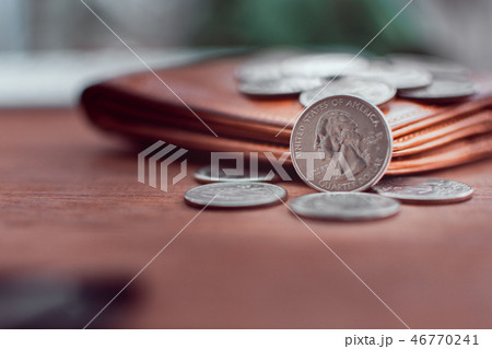 US dollar coins placed outside wallet US dollar coins placed outside wallet 46770241