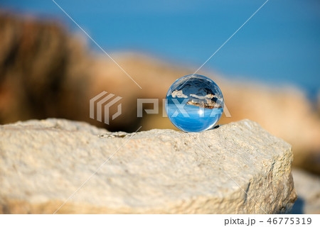 Upside down seascape - reflection in a lensball 46775319