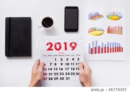 man with a calendar of 2019 man with a calendar of 2019 46778397