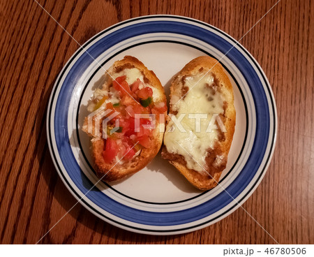 Molletes made of sliced bolillo bread with cheese Molletes made of sliced bolillo bread with cheese 46780506