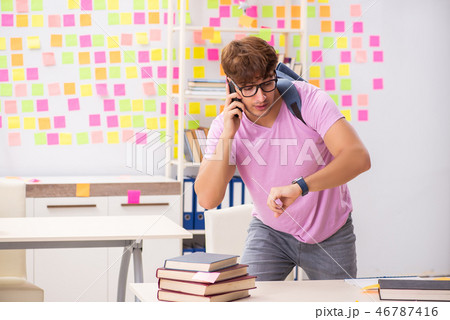 Student preparing for exams with many conflicting priorities  46787416