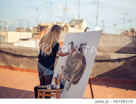 Young woman paint artist drawing at home roof Young woman paint artist drawing at home roof 46788329