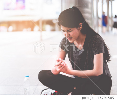 Sport woman having an injury on her wrist hand Sport woman having an injury on her wrist hand 46791505