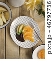 poached apples & fresh orange with chocolate sauce 46797736