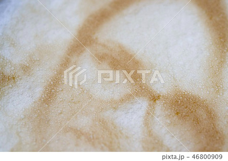 Drawing of a woman's face on a foam coffee latte in a glass created by a 3D printer 46800909